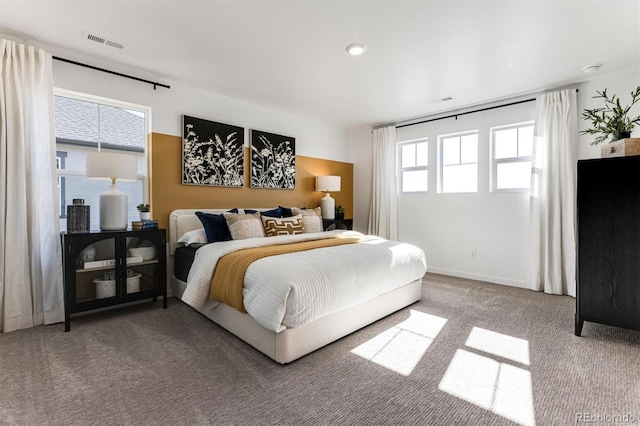 22203 E 6th Pl, Aurora, CO 80018 - carpeted bedroom featuring baseboards