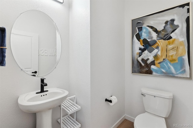 22203 E 6th Pl, Aurora, CO 80018 - bathroom with toilet and baseboards