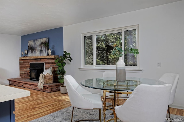 dining space featuring wood finished floors