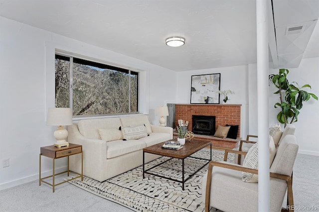 living room featuring baseboards, visible vents, and carpet floors