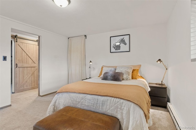 carpeted bedroom with baseboards, a barn door, and a baseboard heating unit