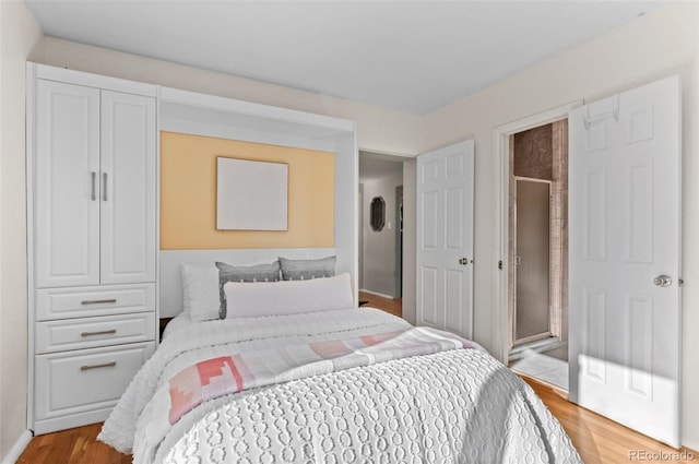 bedroom featuring light hardwood / wood-style floors