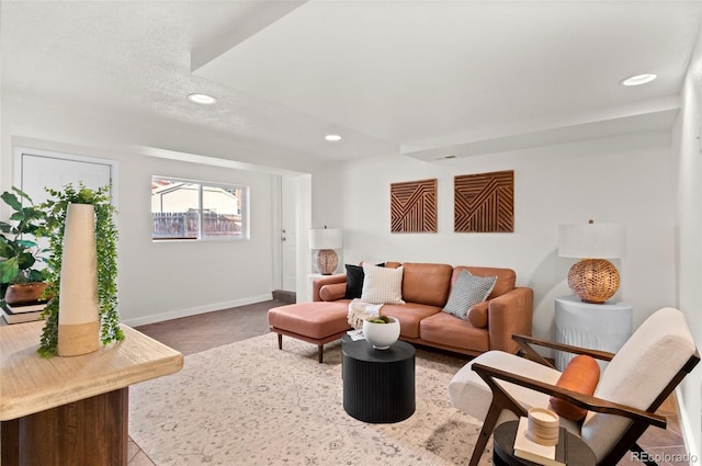 living room with a textured ceiling