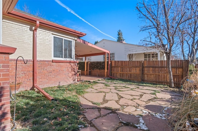 view of patio with fence