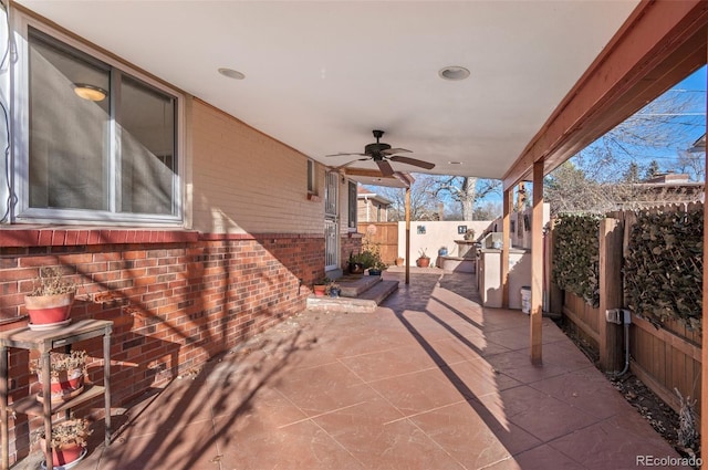 view of patio / terrace featuring a fenced backyard and ceiling fan