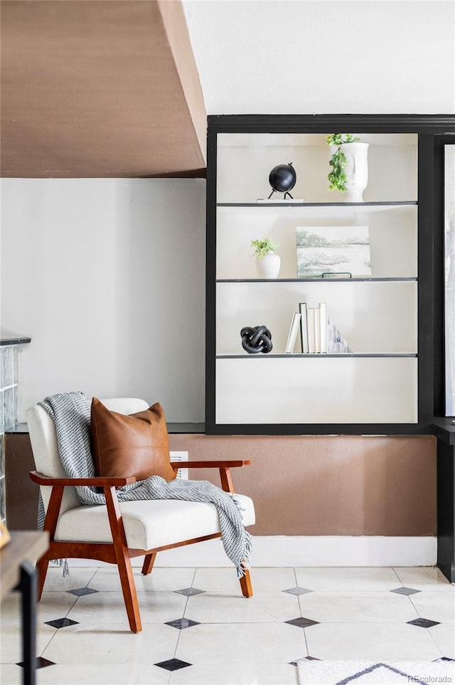 living area with baseboards