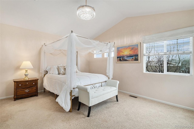 24285 E Wagon Trail Ave, Aurora, CO 80016 - carpeted bedroom featuring vaulted ceiling, baseboards, and a chandelier