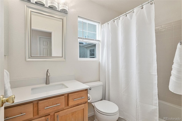 24285 E Wagon Trail Ave, Aurora, CO 80016 - bathroom with vanity, toilet, and shower / bath combination with curtain