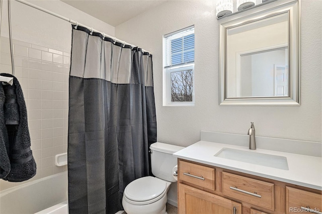 24285 E Wagon Trail Ave, Aurora, CO 80016 - full bathroom with vanity, toilet, shower / bath combo, and a textured wall