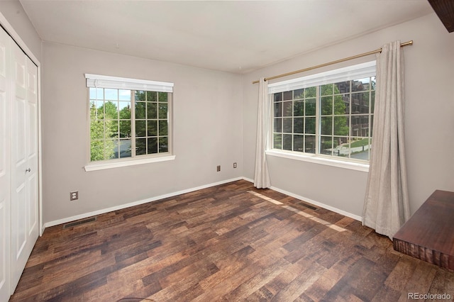 980 Lakepoint Dr Unit 1, Frisco, CO 80443 - unfurnished bedroom featuring wood finished floors and a closet