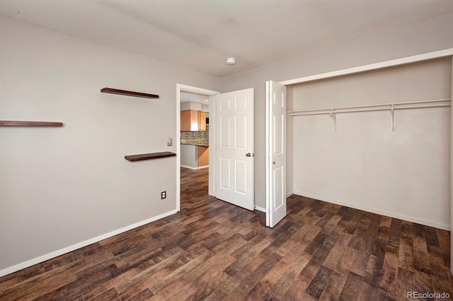980 Lakepoint Dr Unit 1, Frisco, CO 80443 - unfurnished bedroom featuring wood finished floors and a closet