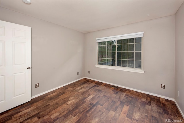 980 Lakepoint Dr Unit 1, Frisco, CO 80443 - empty room featuring dark wood-style floors and baseboards