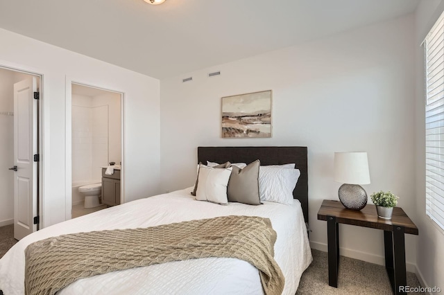 374 N Geneva, Aurora, CO 80010 - carpeted bedroom featuring baseboards and ensuite bathroom