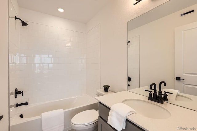 374 N Geneva, Aurora, CO 80010 - bathroom featuring vanity, toilet, bathing tub / shower combination, and recessed lighting