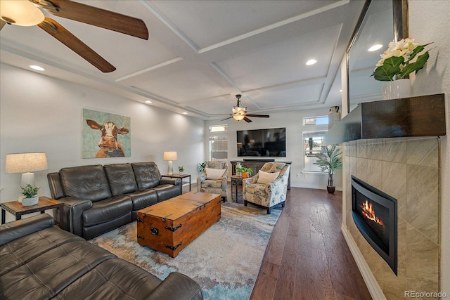 315 Painted Horse Way, Erie, CO 80516 - living room featuring a ceiling fan, coffered ceiling, a fireplace, wood finished floors, and recessed lighting
