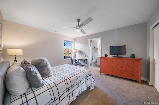 315 Painted Horse Way, Erie, CO 80516 - bedroom featuring light carpet, a ceiling fan, connected bathroom, and baseboards