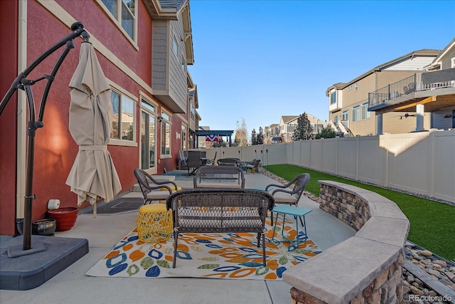 315 Painted Horse Way, Erie, CO 80516 - fenced backyard featuring a patio area, a residential view, and outdoor dining area