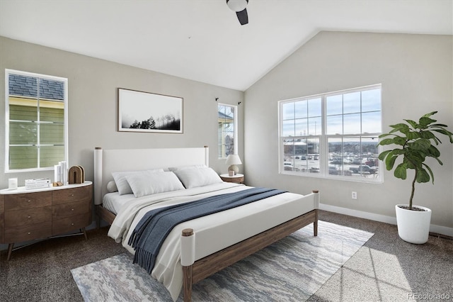 carpeted bedroom featuring ceiling fan and lofted ceiling