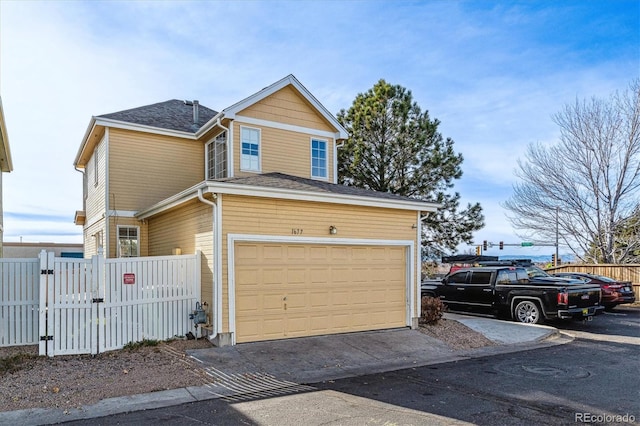 view of front of home with a garage