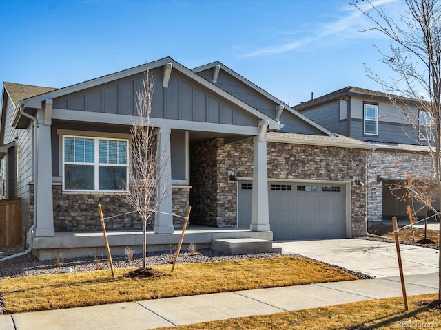 craftsman house with a porch and a garage