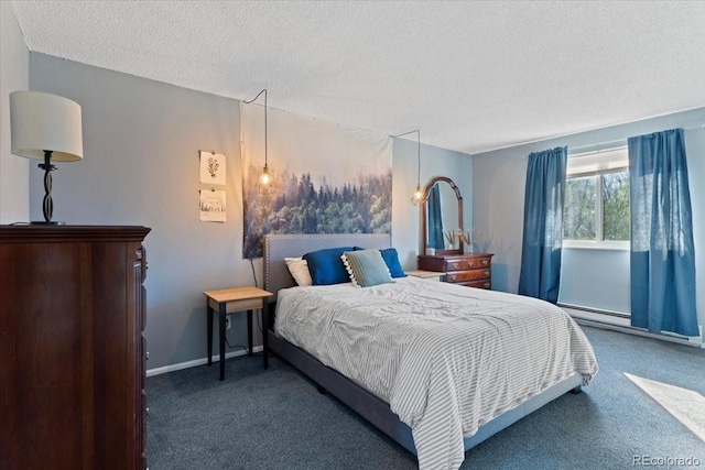 carpeted bedroom featuring a textured ceiling