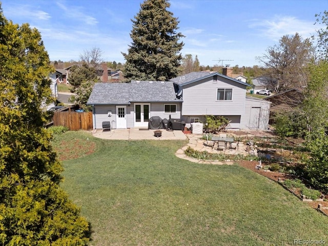 back of house featuring a patio, french doors, a chimney, and central AC unit
