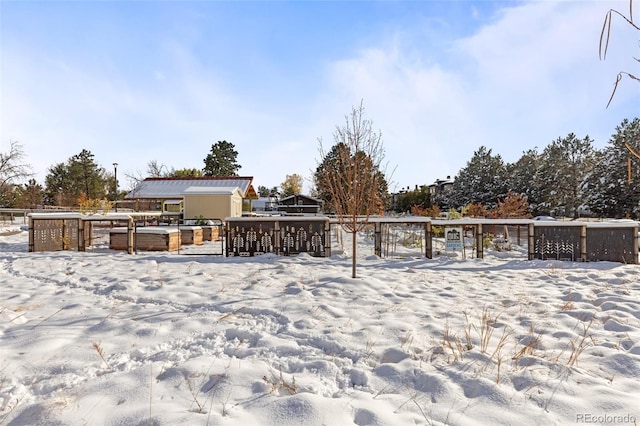 view of yard layered in snow