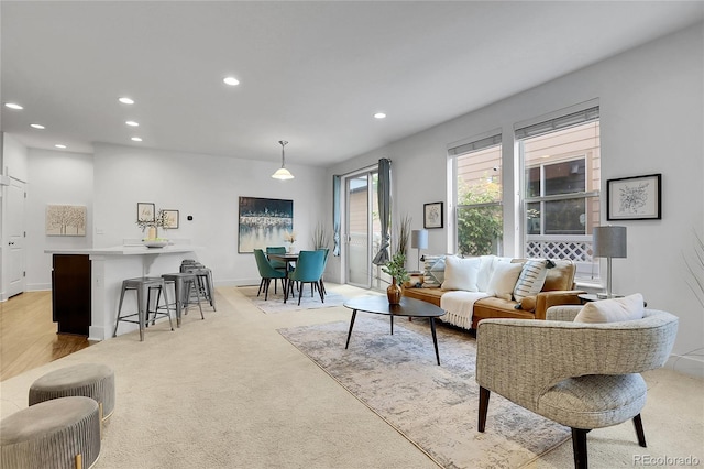 8458 Parkland St, Broomfield, CO 80021 - living area with recessed lighting and light colored carpet
