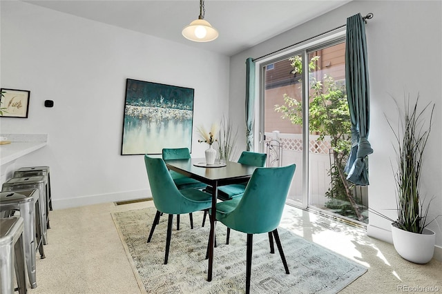 8458 Parkland St, Broomfield, CO 80021 - dining area with carpet and baseboards