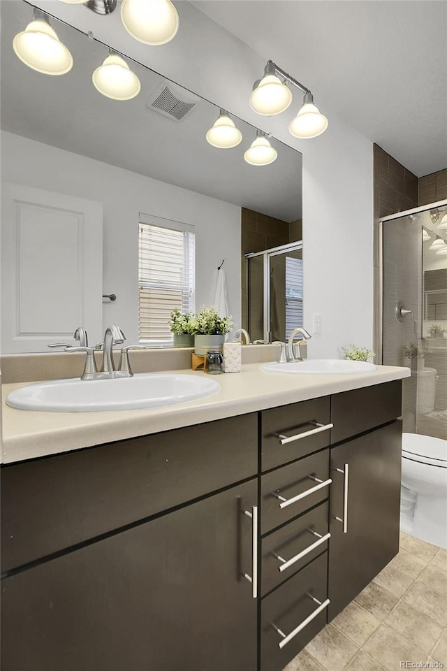 8458 Parkland St, Broomfield, CO 80021 - full bath with double vanity and a stall shower