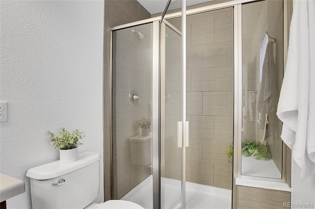 8458 Parkland St, Broomfield, CO 80021 - full bath with a shower stall and a textured wall