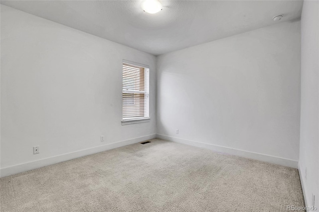 8458 Parkland St, Broomfield, CO 80021 - carpeted spare room with baseboards and a smoke detector