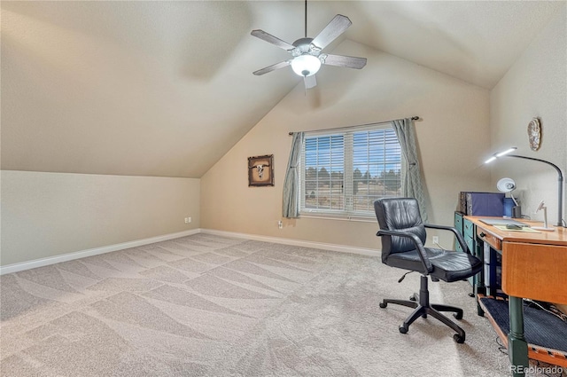 carpeted office featuring ceiling fan and vaulted ceiling