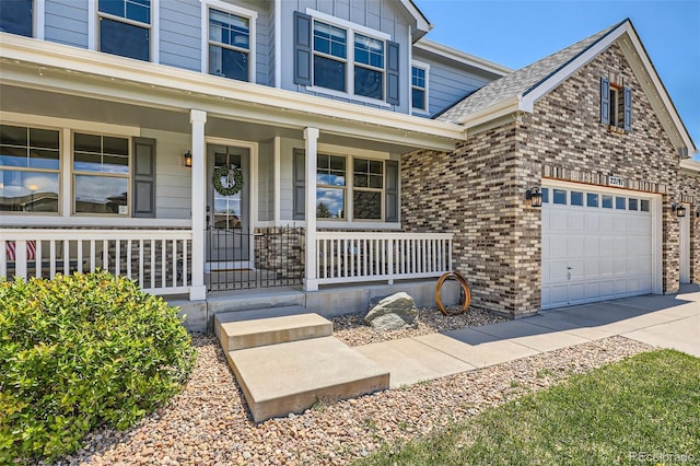 22197 E Stroll Ave, Parker, CO 80138 - view of front of property featuring covered porch and concrete driveway