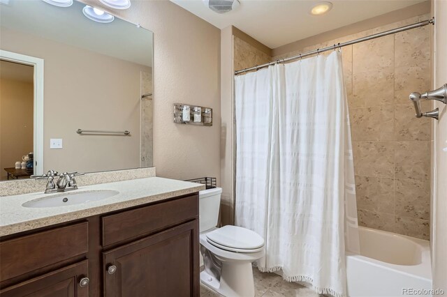 22197 E Stroll Ave, Parker, CO 80138 - bathroom featuring vanity, toilet, shower / tub combo, and tile patterned flooring