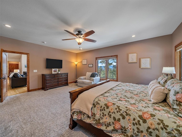 bedroom with recessed lighting, baseboards, light colored carpet, and ceiling fan