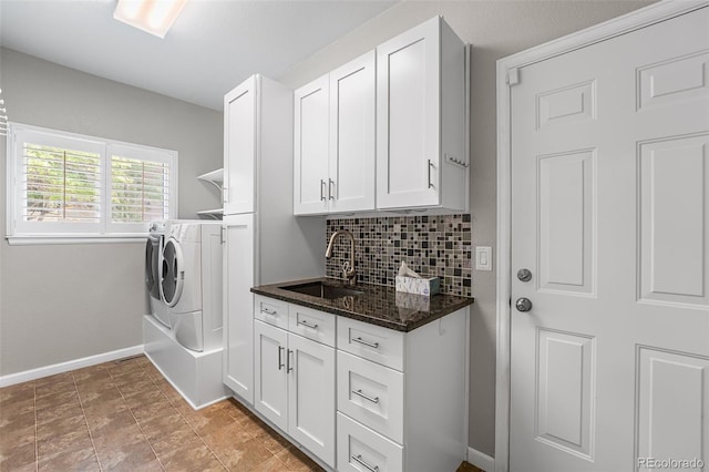 9365 Erminedale Dr, Lone Tree, CO 80124 - laundry room with independent washer and dryer and cabinet space