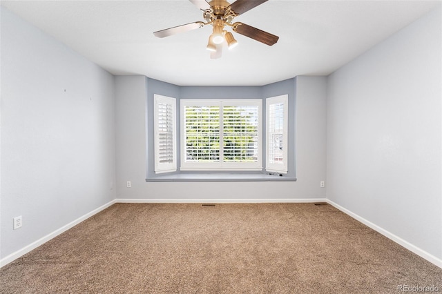9365 Erminedale Dr, Lone Tree, CO 80124 - carpeted empty room with baseboards and a ceiling fan