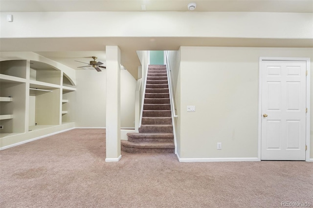 9365 Erminedale Dr, Lone Tree, CO 80124 - finished basement featuring carpet floors, a ceiling fan, and stairway