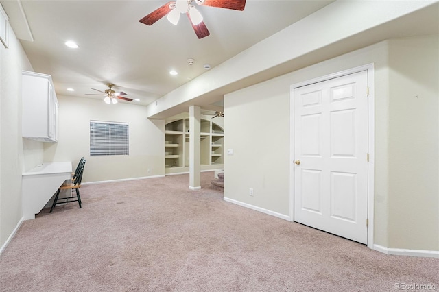 9365 Erminedale Dr, Lone Tree, CO 80124 - unfurnished living room with a ceiling fan, light colored carpet, recessed lighting, an office area, and built in features