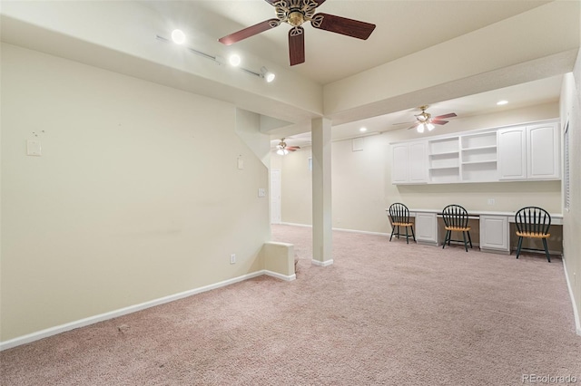 9365 Erminedale Dr, Lone Tree, CO 80124 - living area with light carpet, a ceiling fan, and recessed lighting