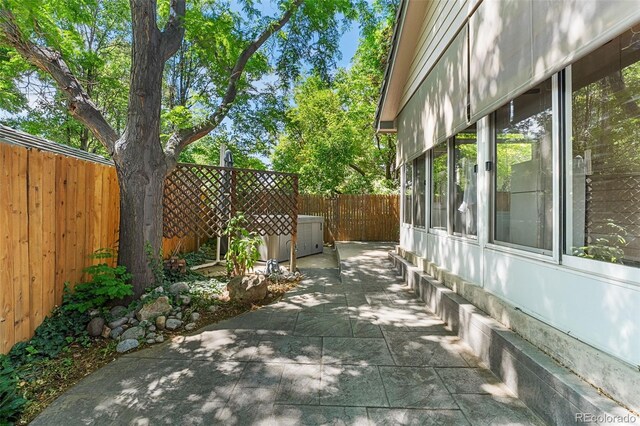 9365 Erminedale Dr, Lone Tree, CO 80124 - fenced backyard with a patio