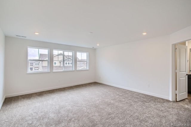 4588 Thistle Dr, Brighton, CO 80601 - carpeted spare room with baseboards and recessed lighting