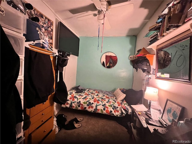 carpeted bedroom featuring ceiling fan