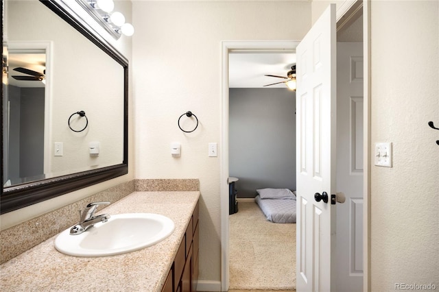 20389 E Powers Pl, Centennial, CO 80015 - bathroom with ceiling fan and vanity