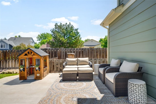 20389 E Powers Pl, Centennial, CO 80015 - fenced backyard with a patio area and outdoor lounge area