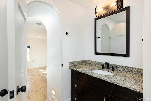 bathroom with vanity and tile patterned flooring