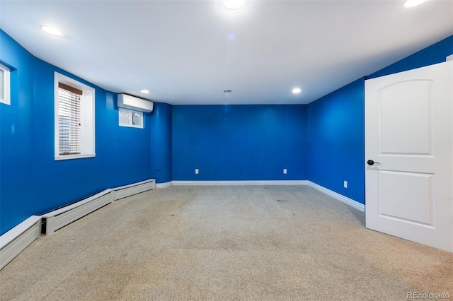 unfurnished room with a wall mounted AC and carpet flooring