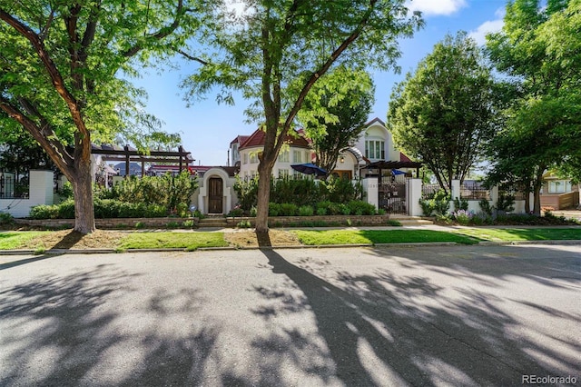 view of front of house featuring a pergola