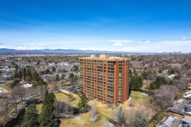birds eye view of property with a mountain view